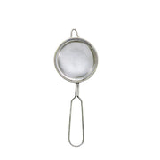 A metal mesh strainer with a long handle